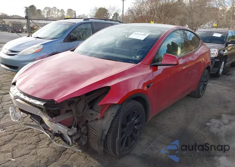 2023 Tesla Model Y Awd/Long Range Dual Motor All-Wheel Drive z USA, uszkodzony, nr VIN 7SAYGDEE3PA099340
